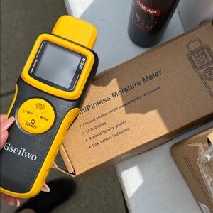 Yellow and Black Pinless Moisture Meter